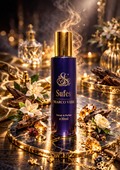 Purple perfume bottle labeled 'Sufes' on a decorative table with flowers and candles.